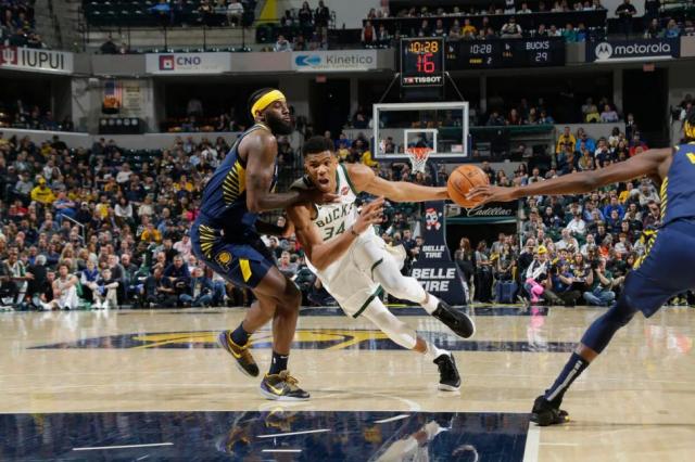 Bucks y Heat contin�an firmes